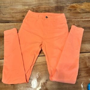 Neon coral pants. New without tags. Size large but fit like a medium.